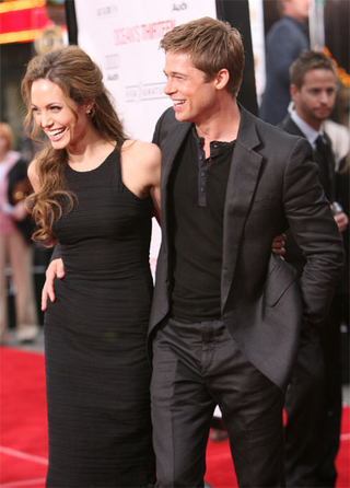Illustration for article titled Brad & Angelina Seem To Be Proving Naysaying Tabloids Wrong